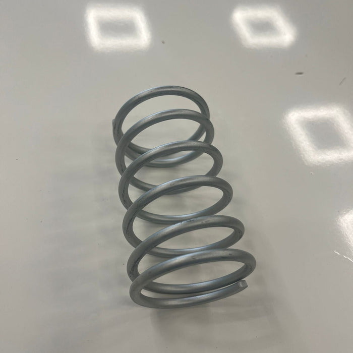 Spring for bottom discharge